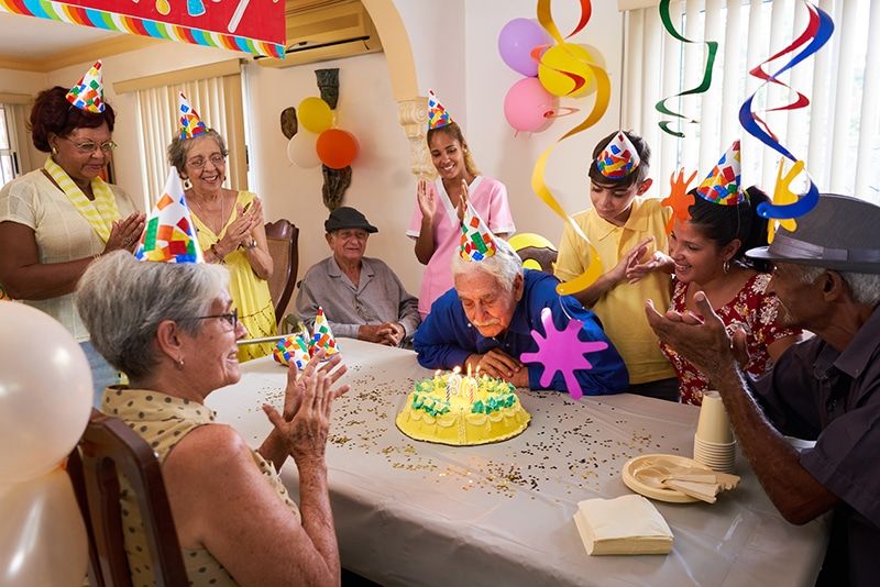 Older Adults Joyfully Celebrating a Birthday in Allen, TX